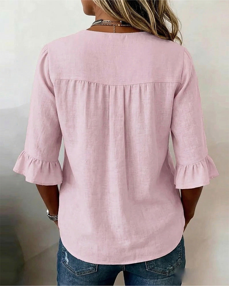 V-Neck Blouse with Wooden Buttons and Ruffled Sleeves